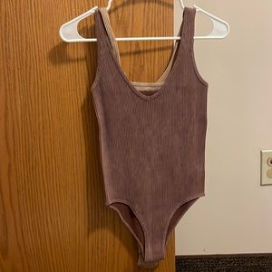 Two pack bodysuit! Never worn. Shades of brown. Size M/L